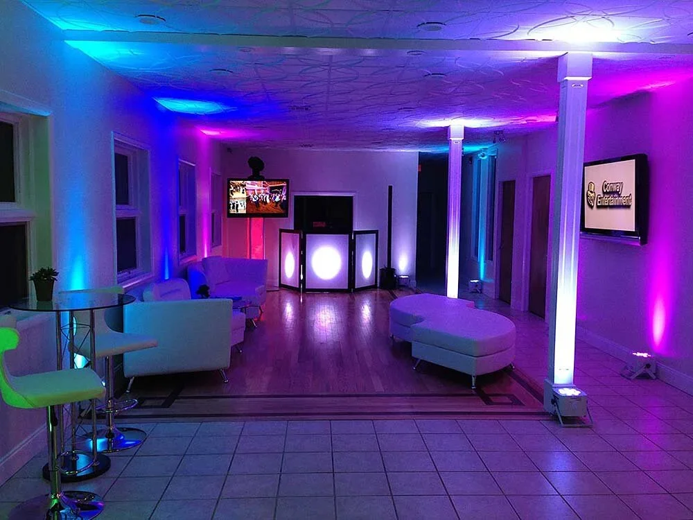 Reception room uplit in purple